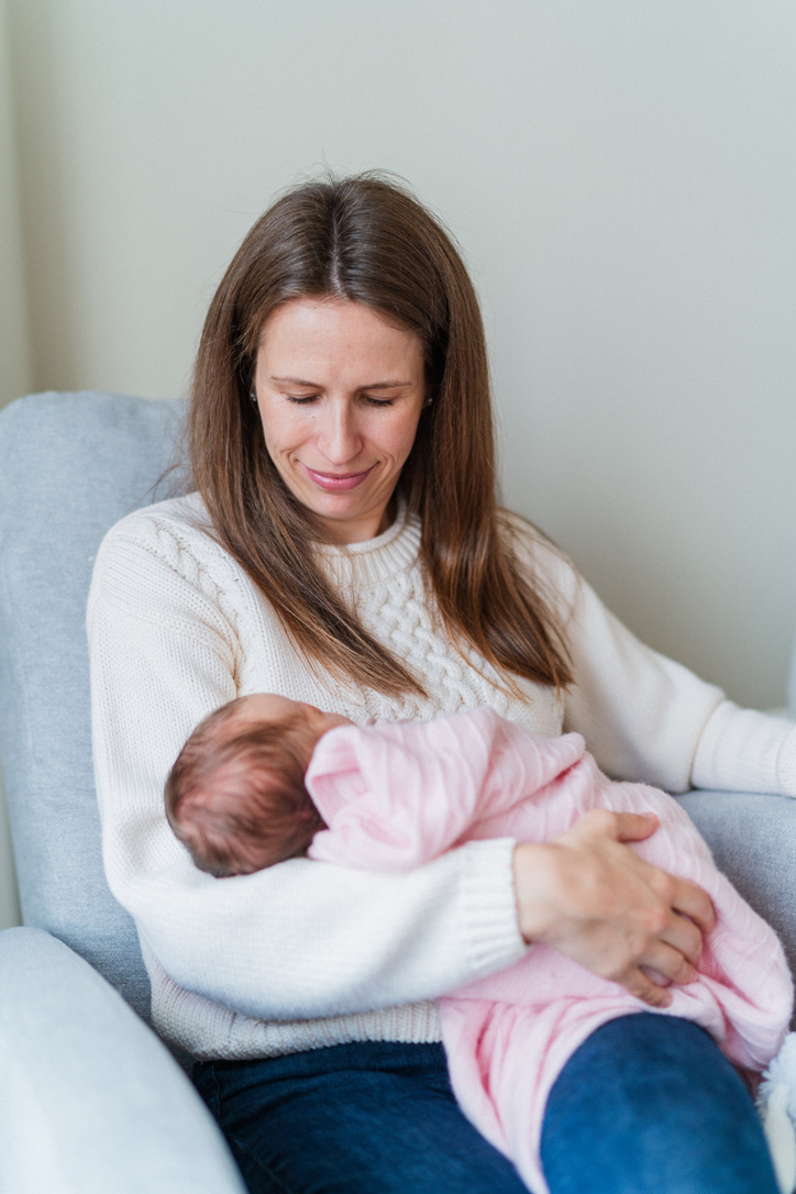 A new mother holding her baby